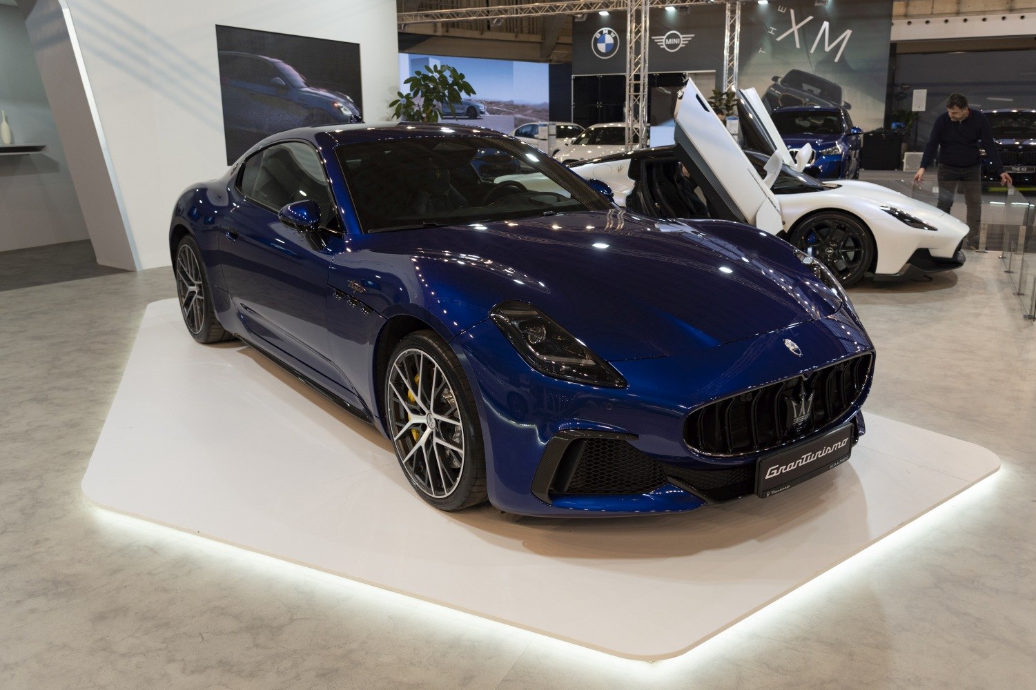 Front grille and detailed wheels of a luxury sports coupe