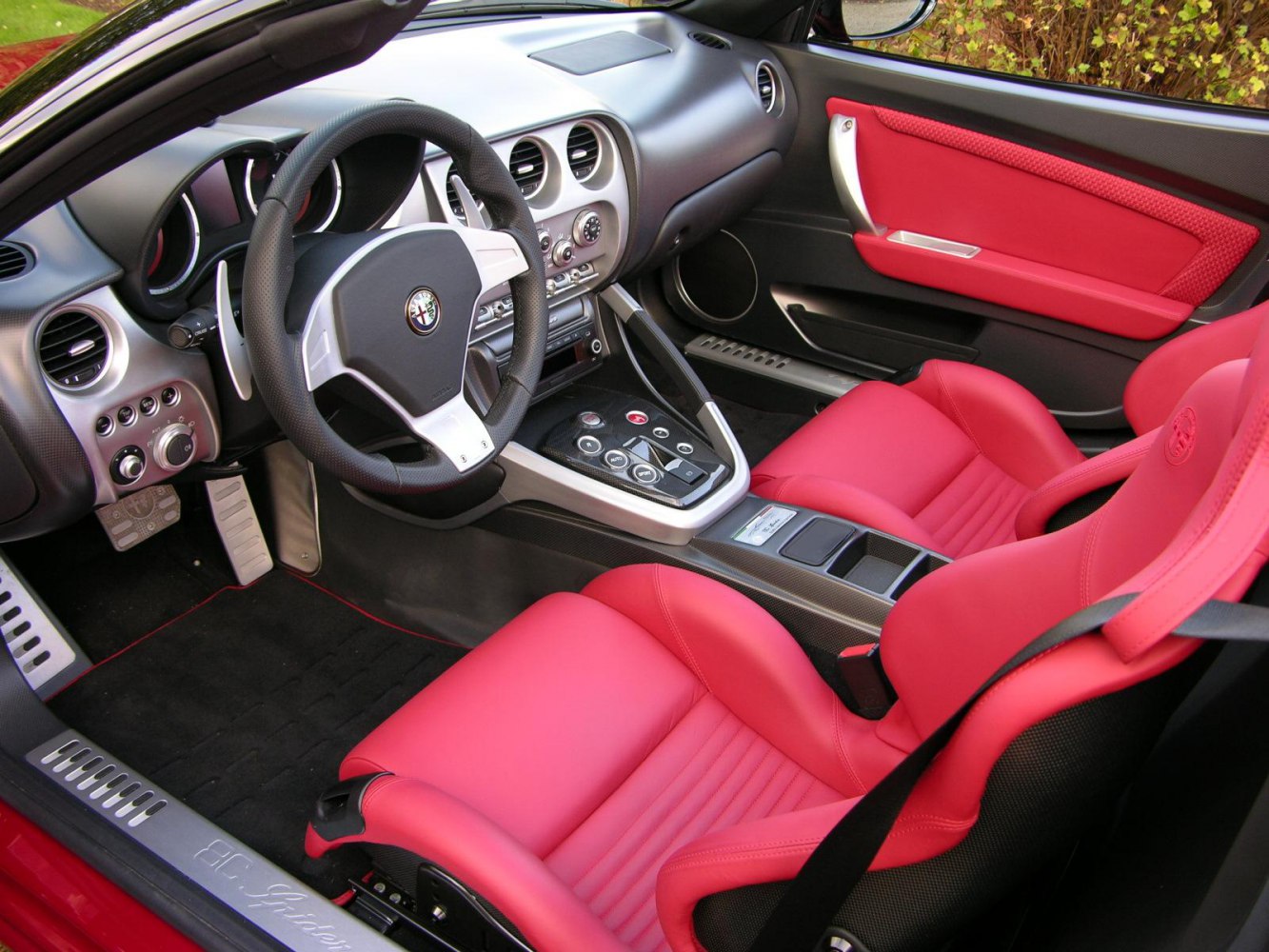 Red leather sports seats and sporty car interior design