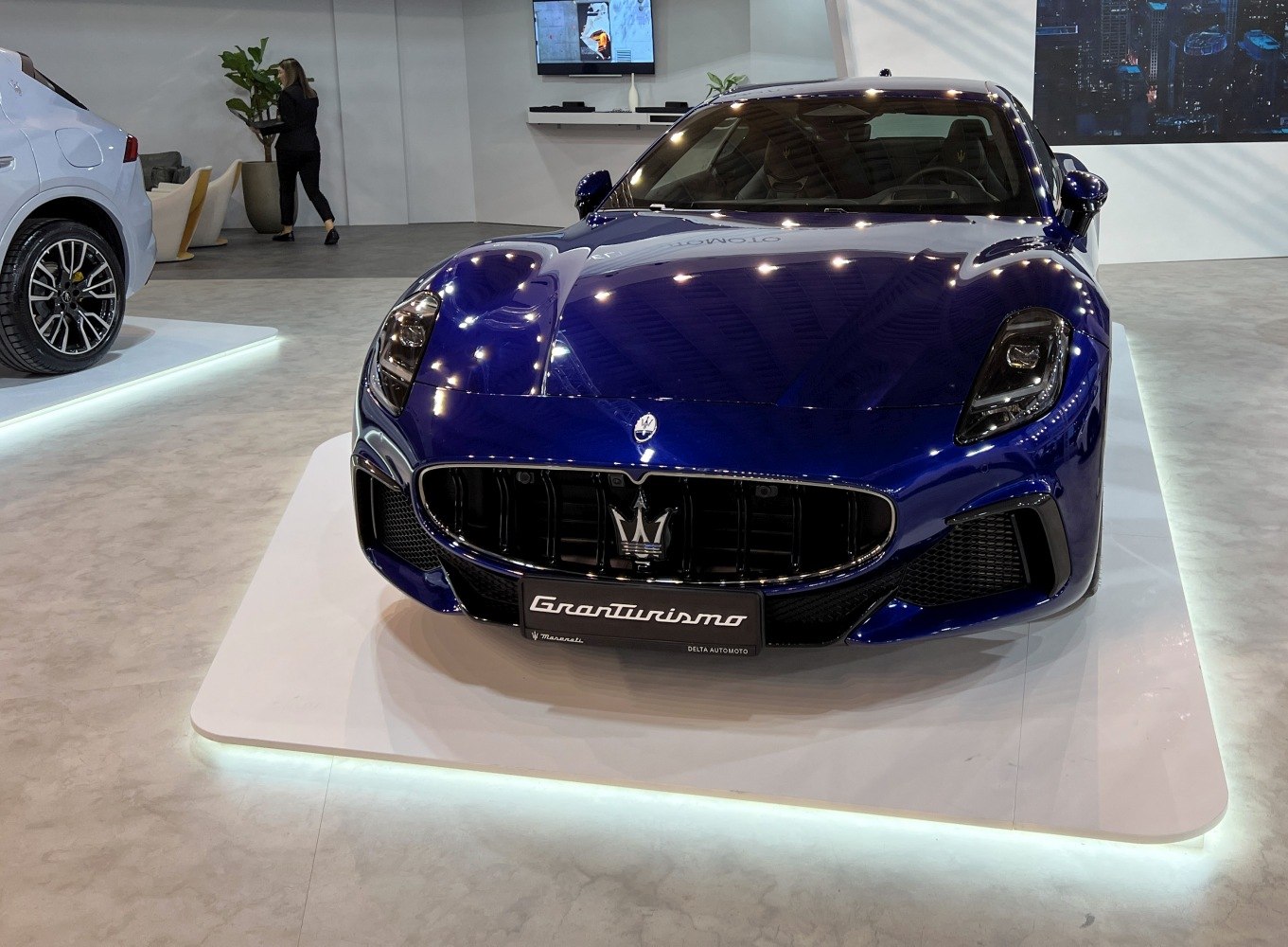 Front view with signature grille and sharp headlights