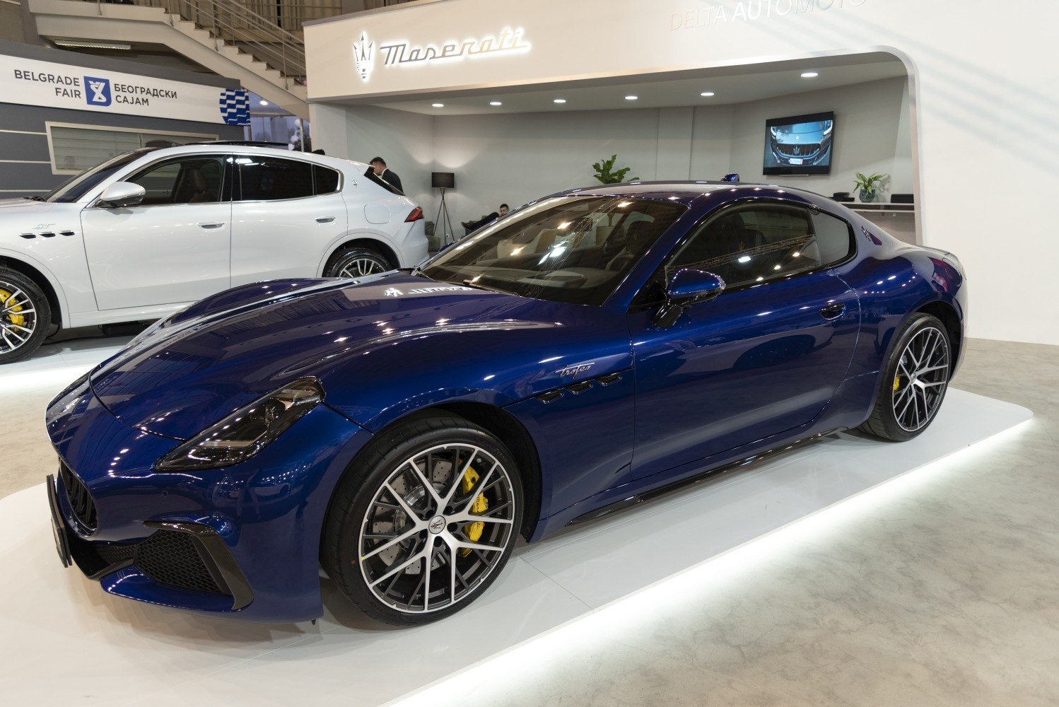Front side view with detailed wheels and aerodynamic body design