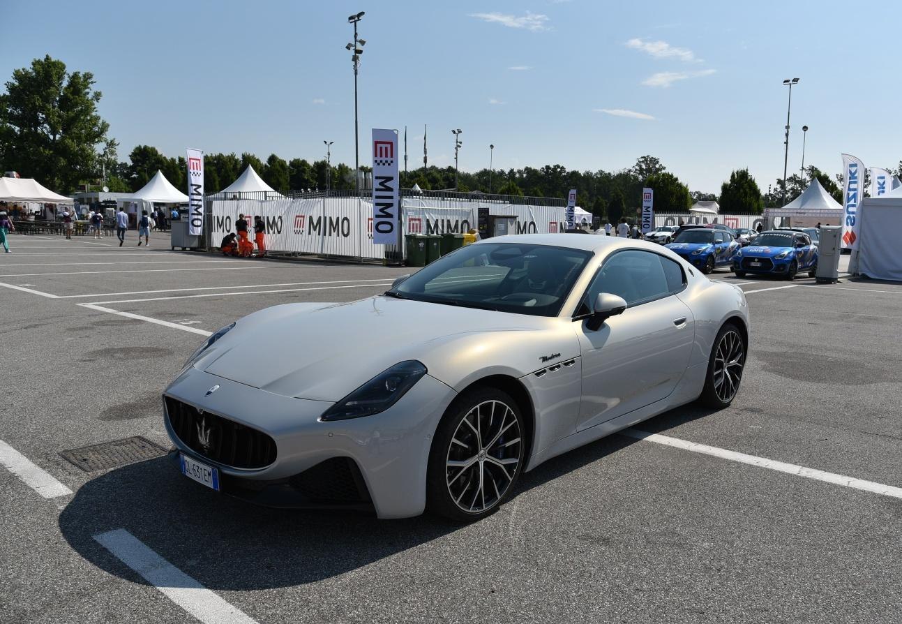Front-side view of a sleek luxury coupe with stylish alloy wheels