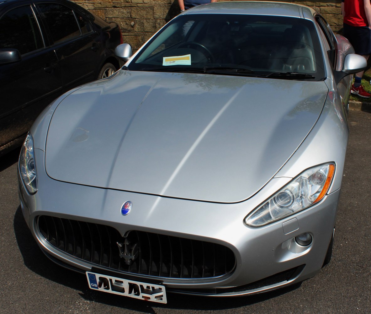 Front view with iconic grille and distinctive headlights