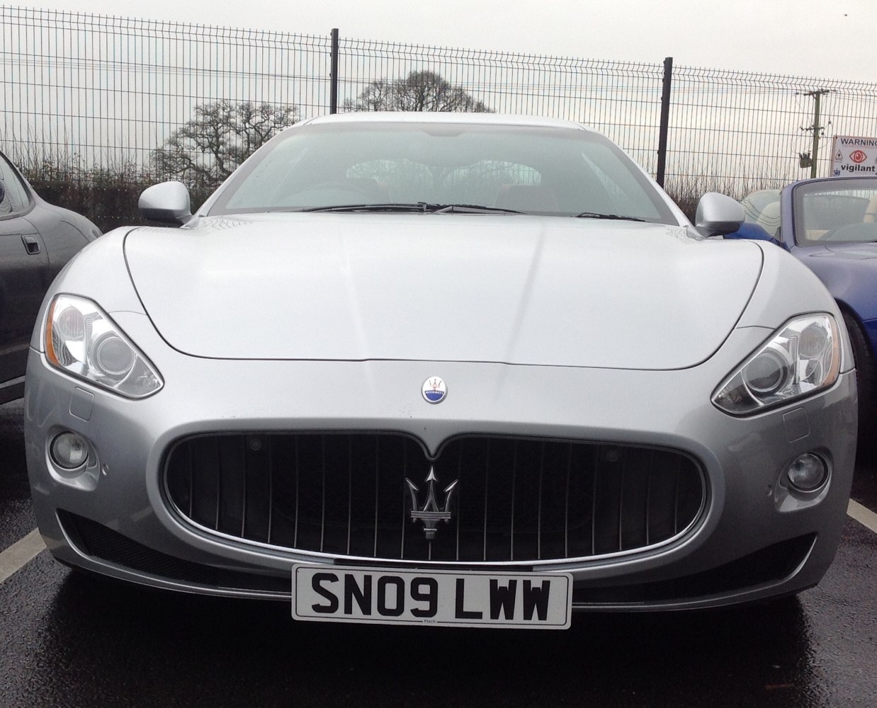 Front view with distinctive grille and headlights