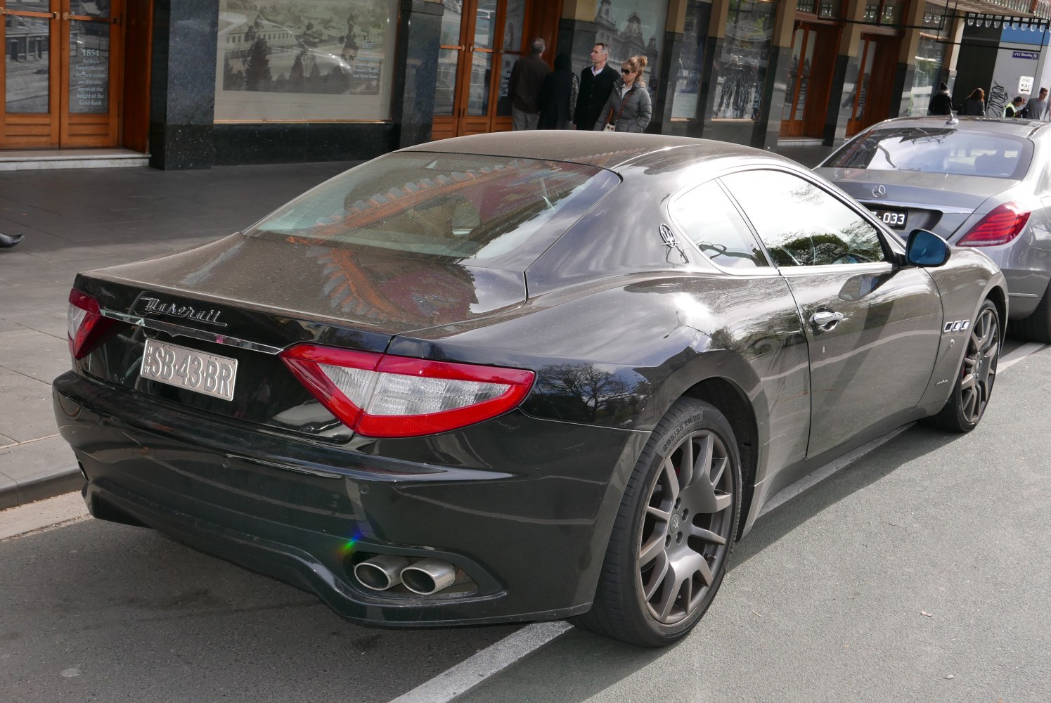 Luxury coupe rear design with dual exhaust and sleek silhouette