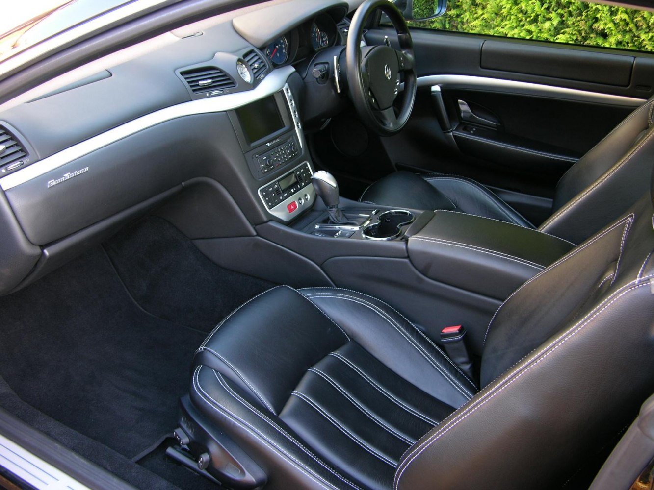 Black leather seats and modern dashboard layout