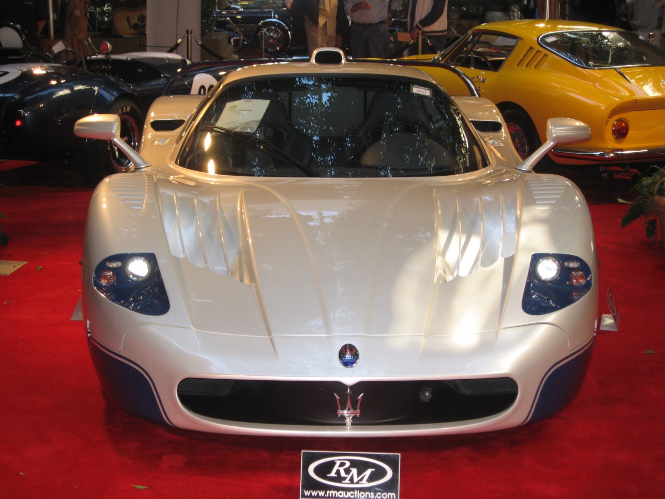 Aerodynamic hood and headlights of a high-performance sports car