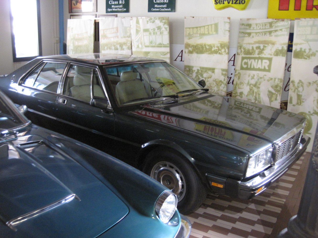 Vintage luxury sedan with boxy design and chrome accents