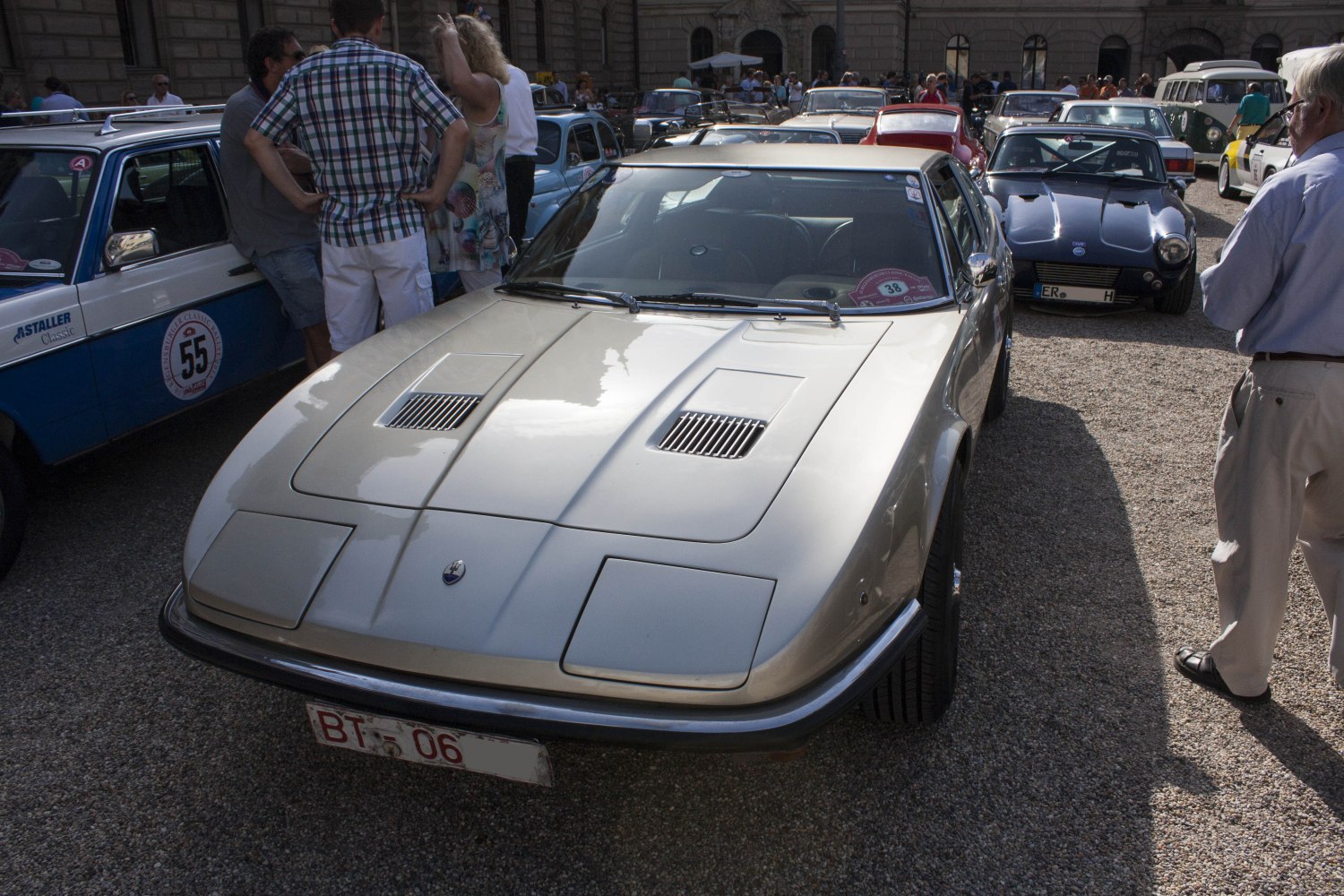 Front view of classic coupe with vented hood