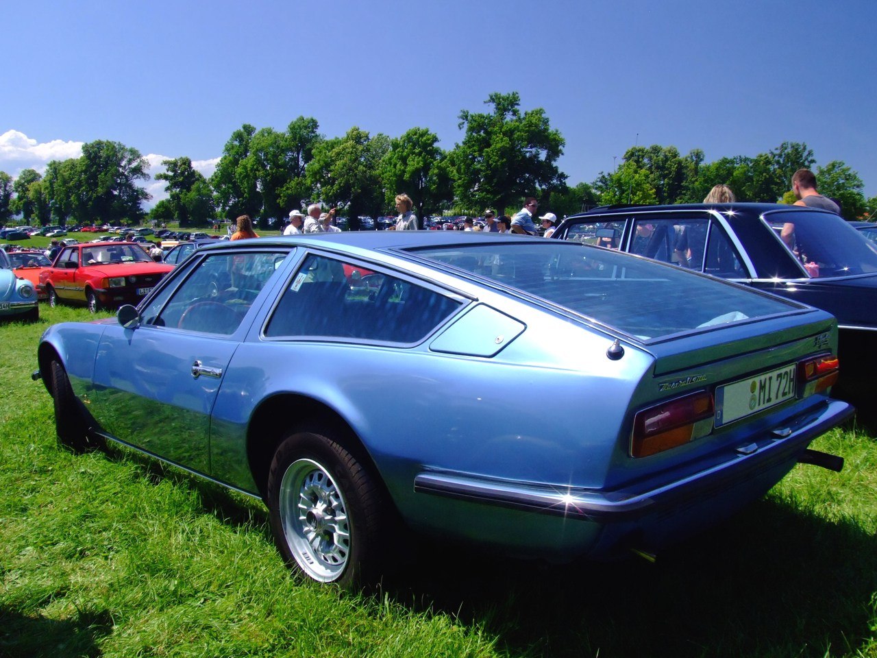 Classic coupe with distinctive fastback rear and sloping rear window