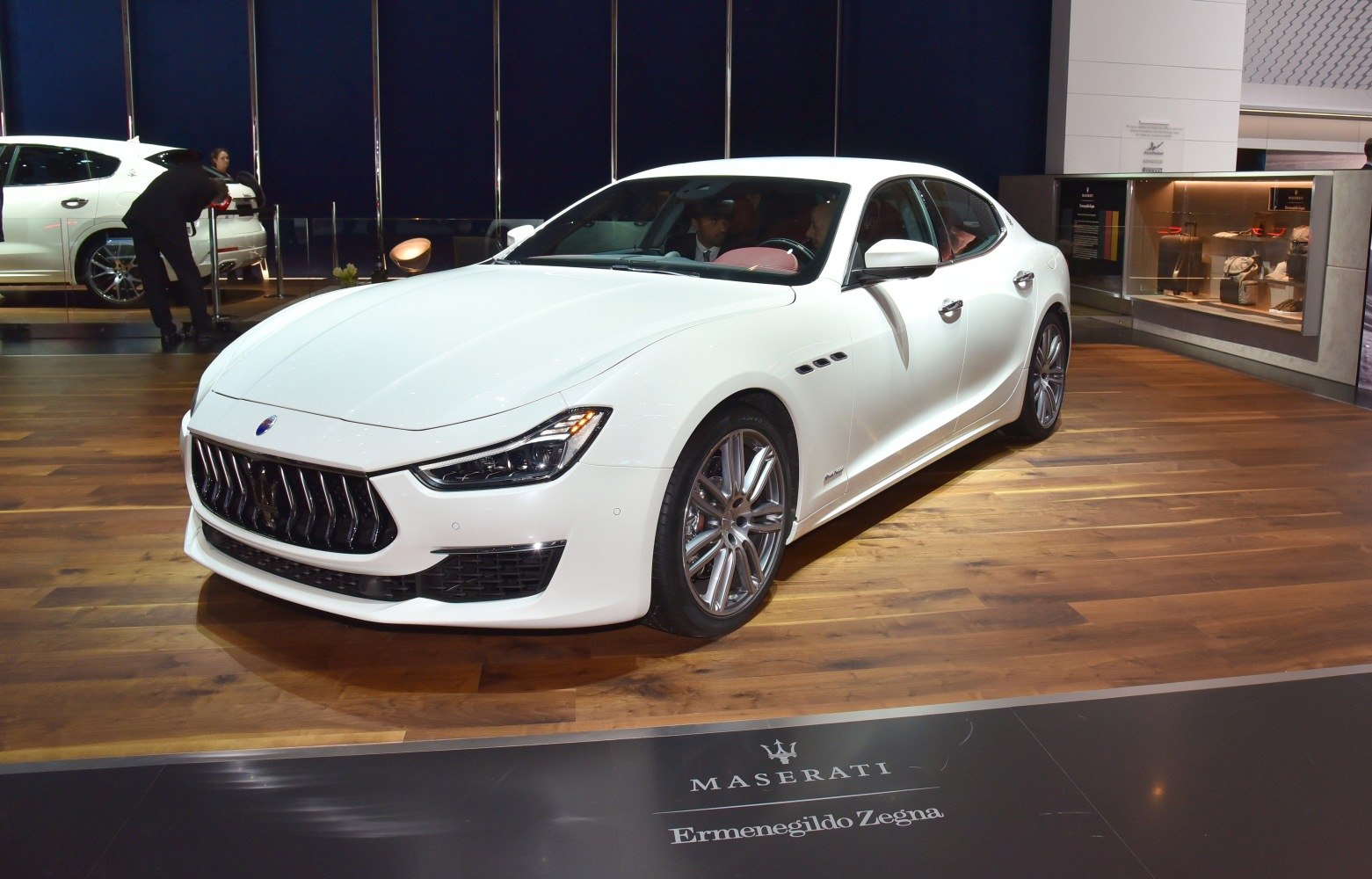 Front view of luxury sedan with signature grille and sleek headlights