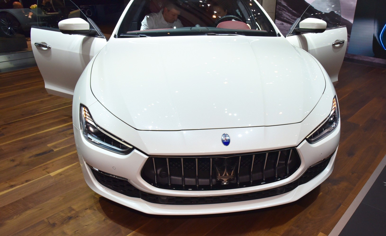 Front view with signature grille and LED headlights