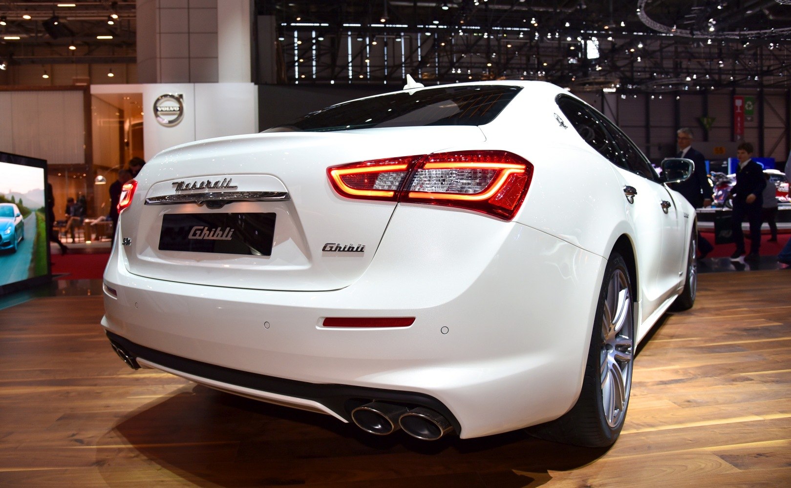 Rear view with LED taillights and quad exhaust pipes.