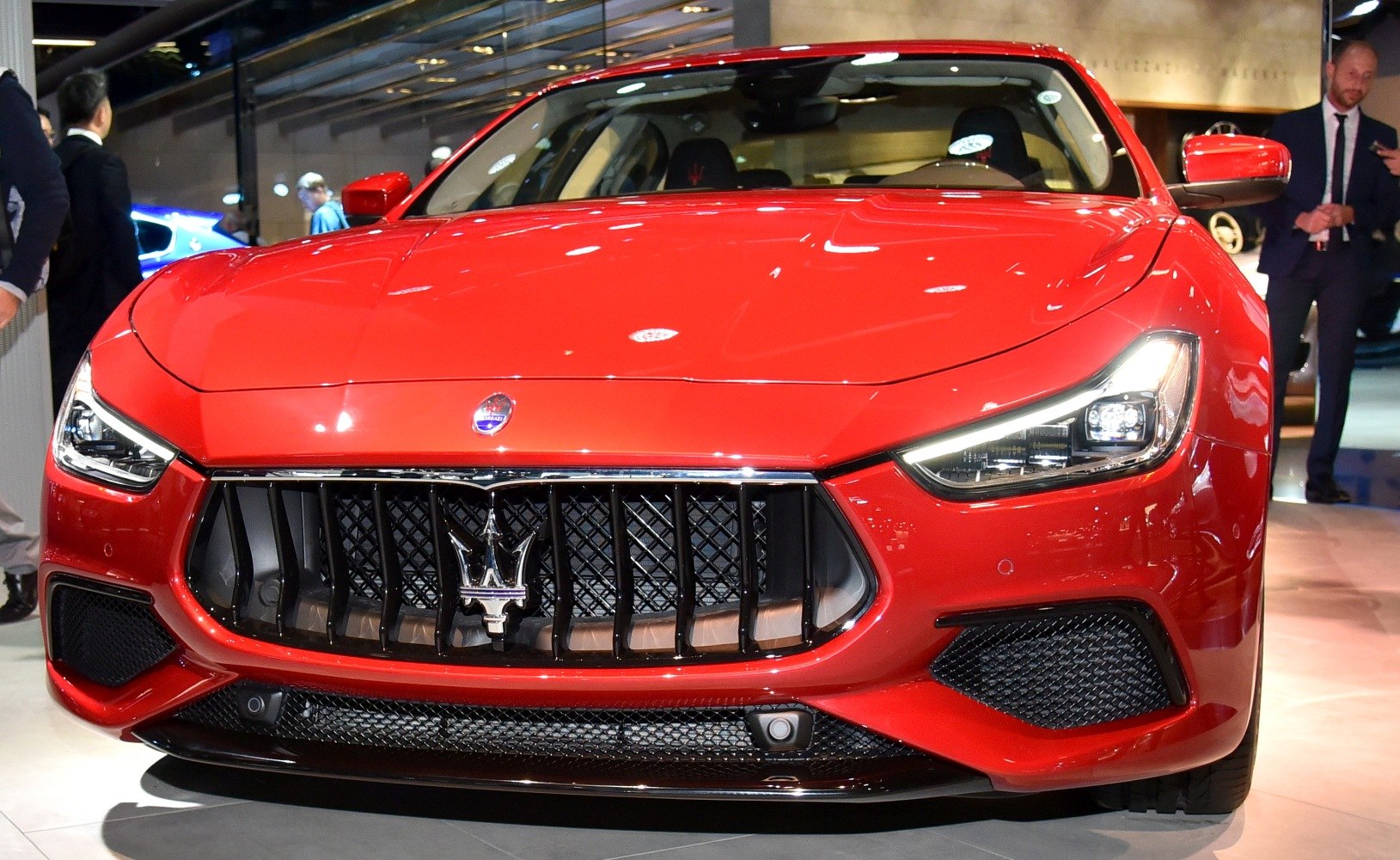 Front view with signature grille and LED headlights