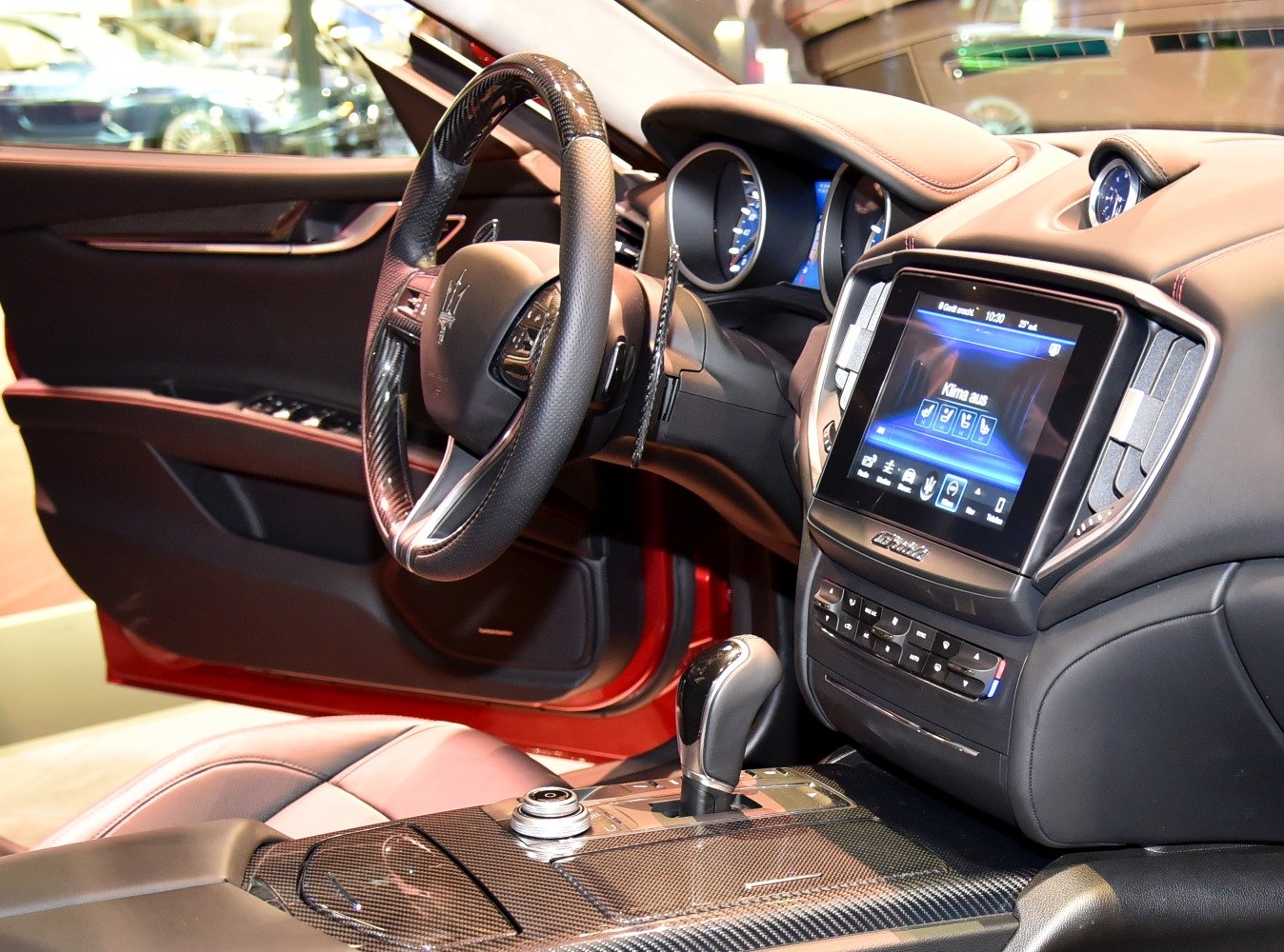 Carbon fiber steering wheel, touchscreen infotainment, digital gauges