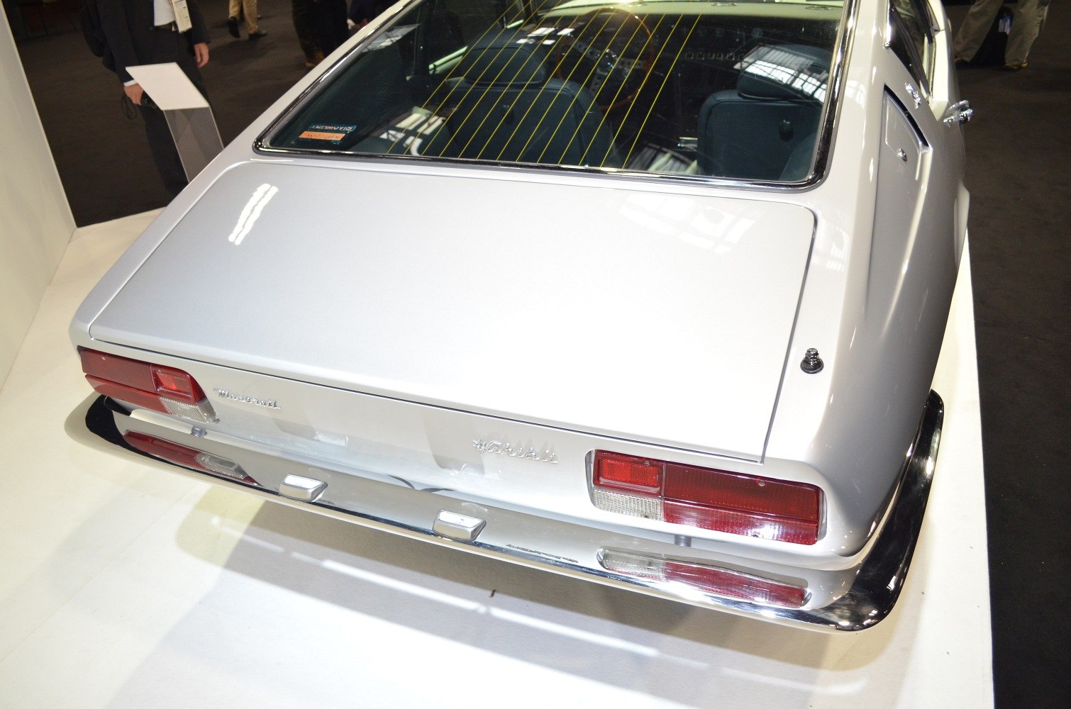 Rear view with distinct tail lights and chrome bumper