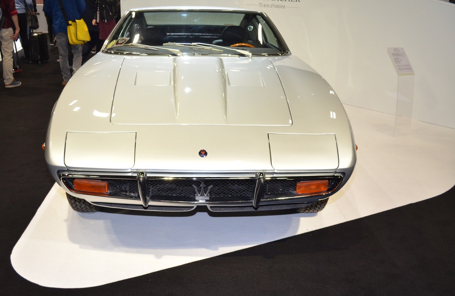 Front view showcasing hood scoop and pop-up headlights.
