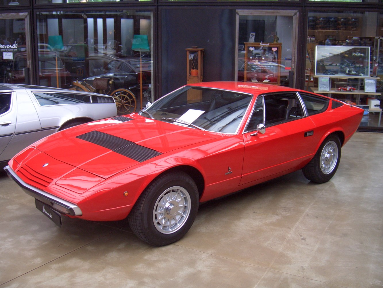 Classic sports coupe with sleek aerodynamic front and side profile.