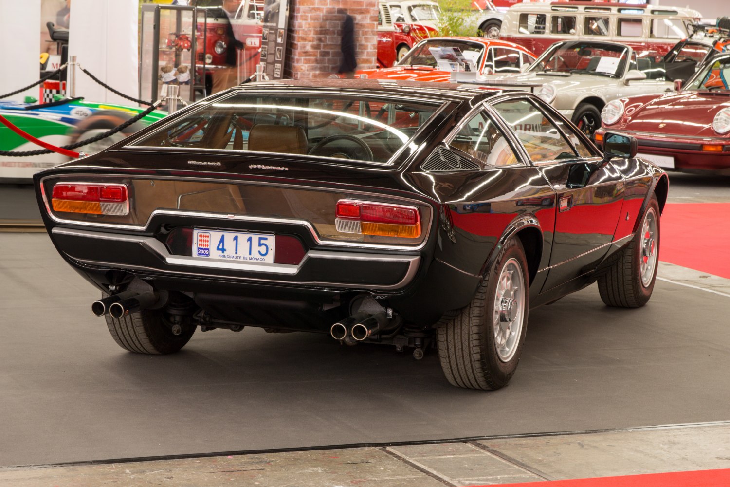 Rear view with dual exhaust and distinctive angular tail lights