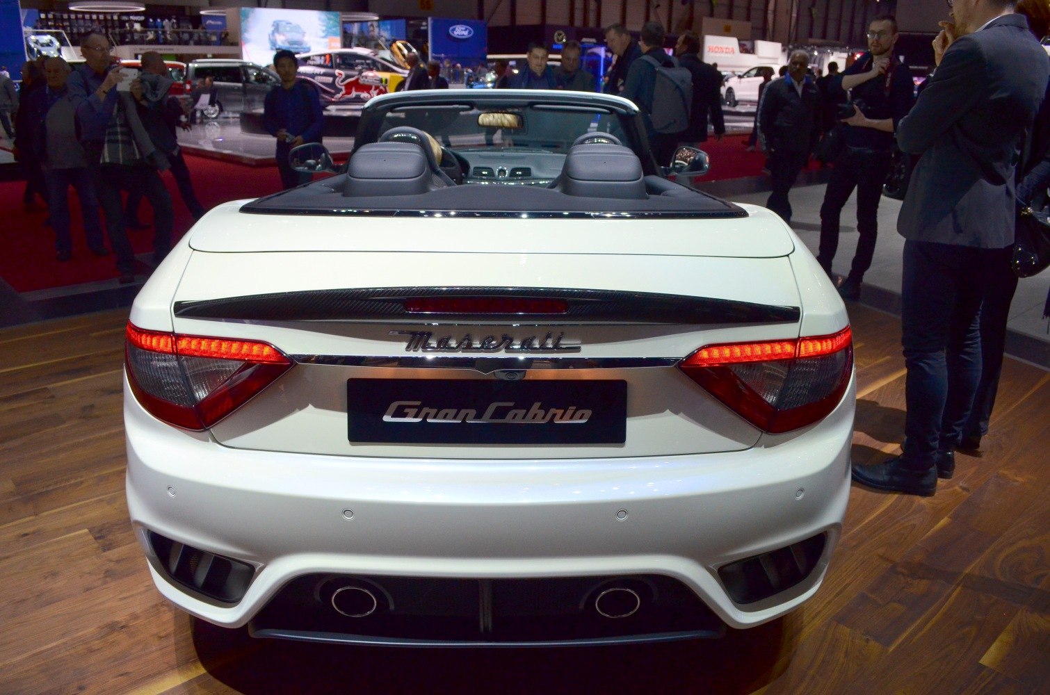 Convertible rear view with taillights and dual exhausts
