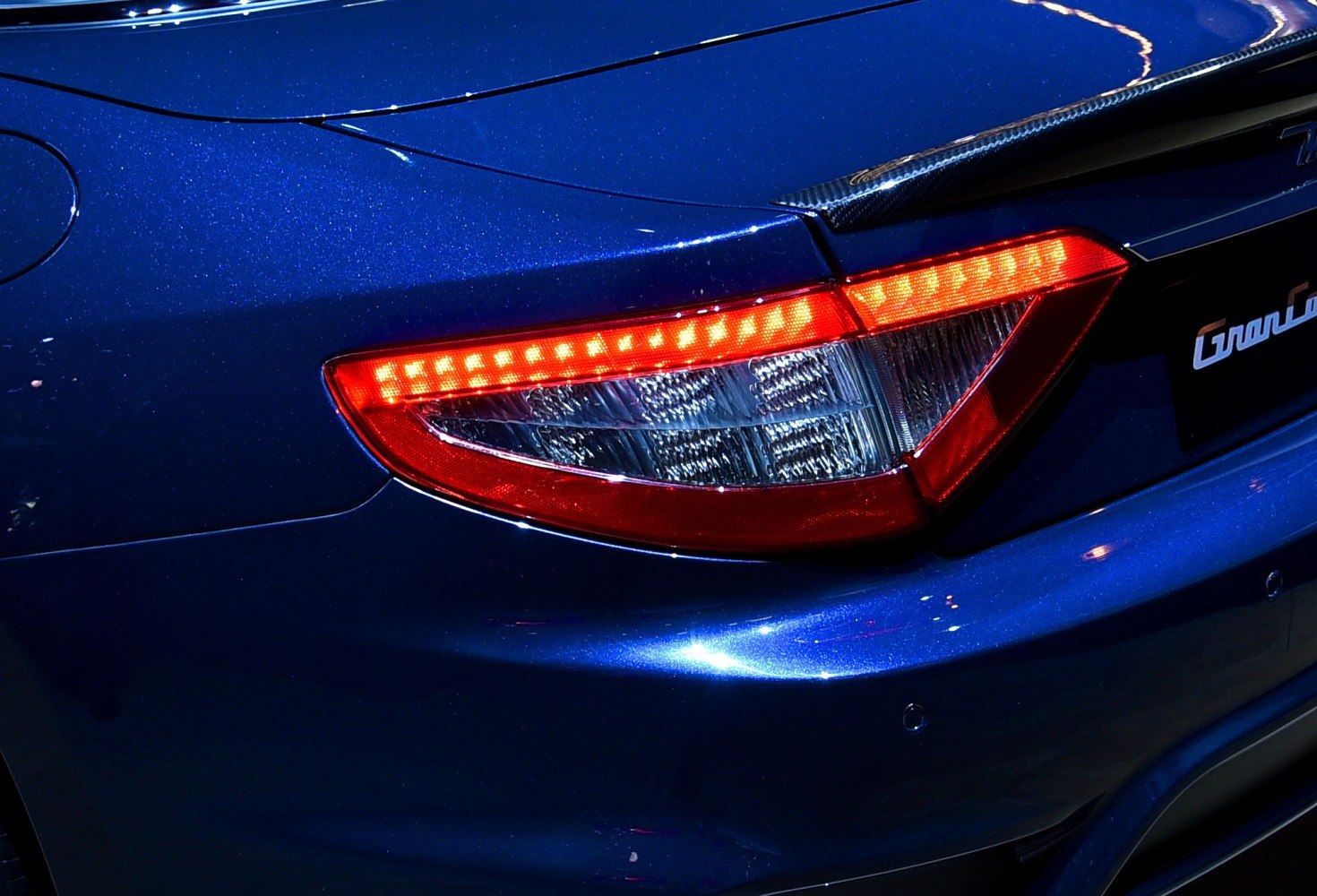 Distinctive LED rear taillight with blue paint and rear bumper