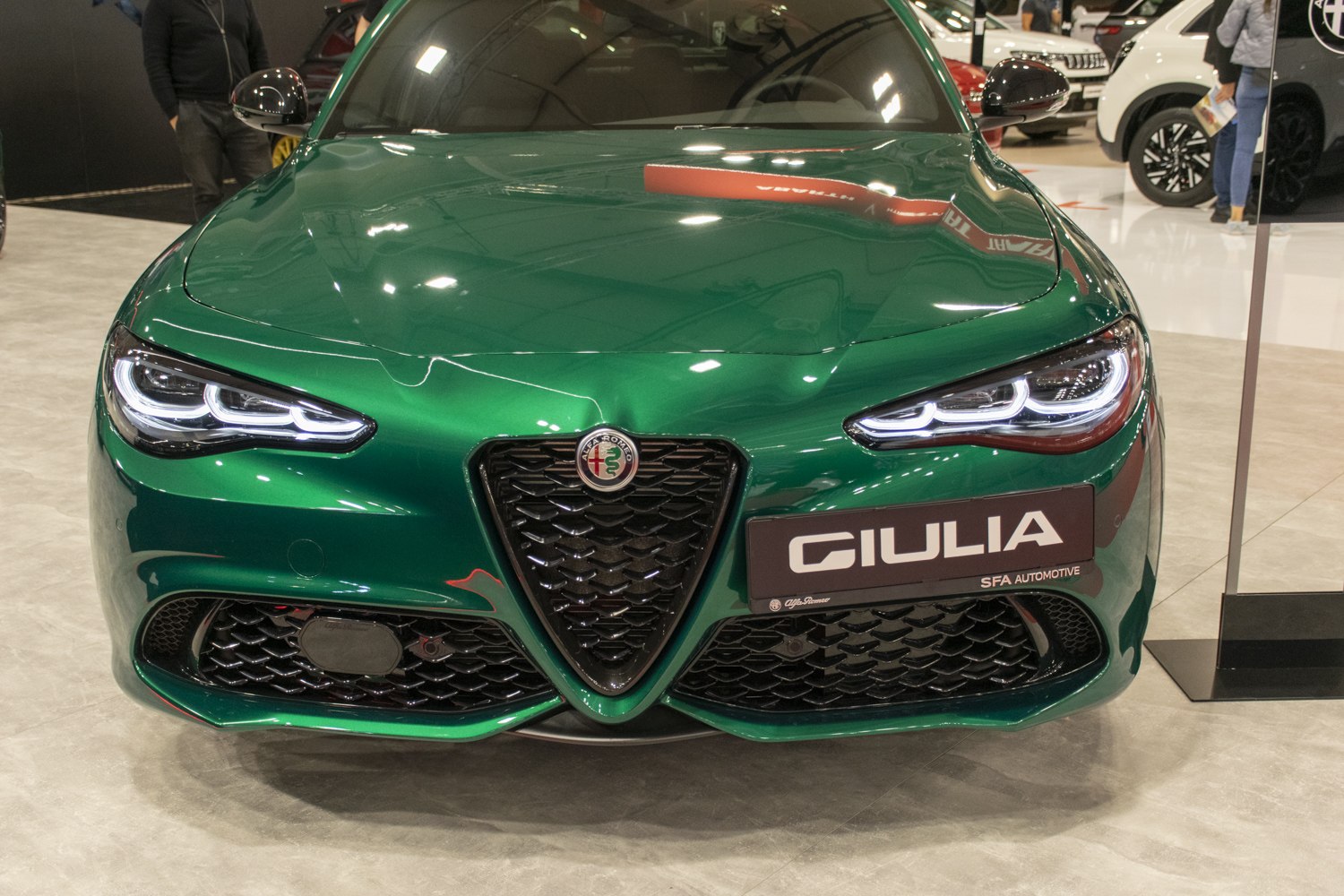 Modern car front with iconic grille and LED headlights