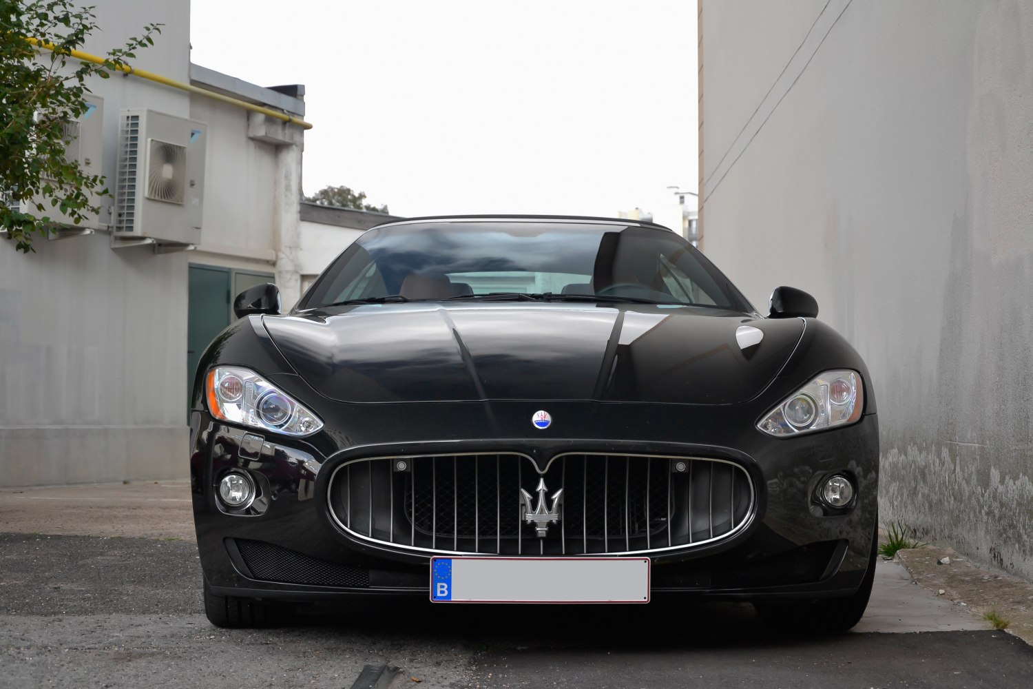 Front view with distinctive grille and headlights