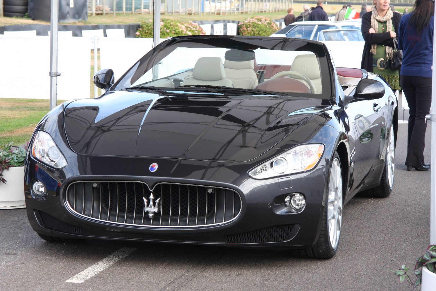 Convertible front view with iconic Maserati grille and headlights