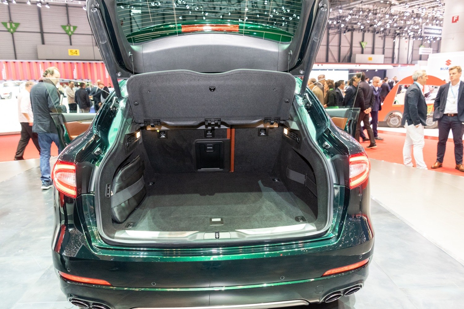 Large open trunk with spacious cargo area and rear lighting