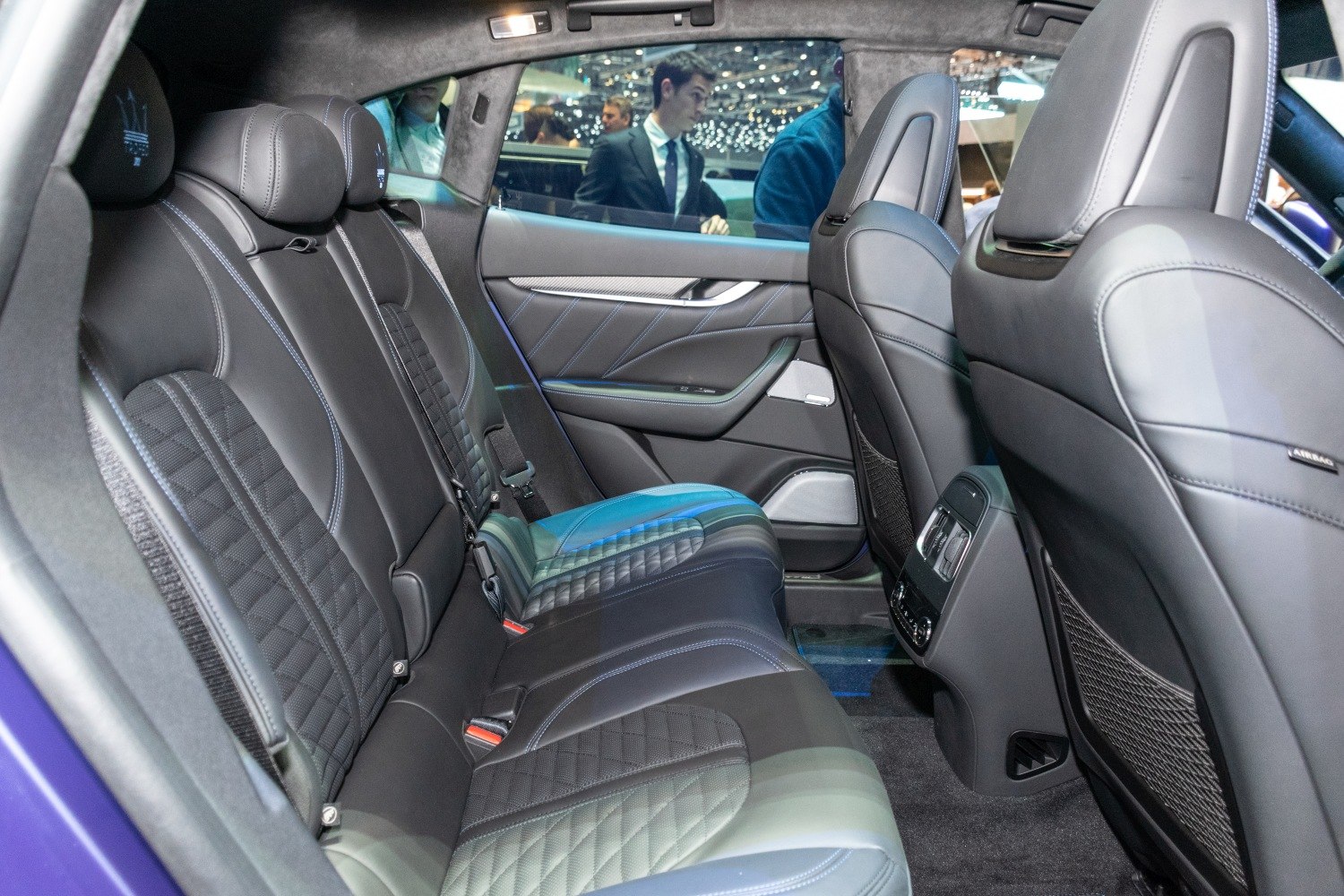 Luxury quilted leather rear seats with ambient lighting