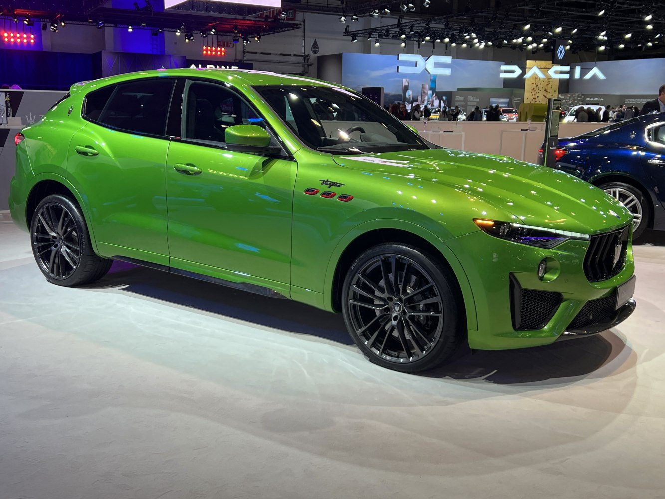 Vibrant green SUV with sporty black wheels and sleek body design