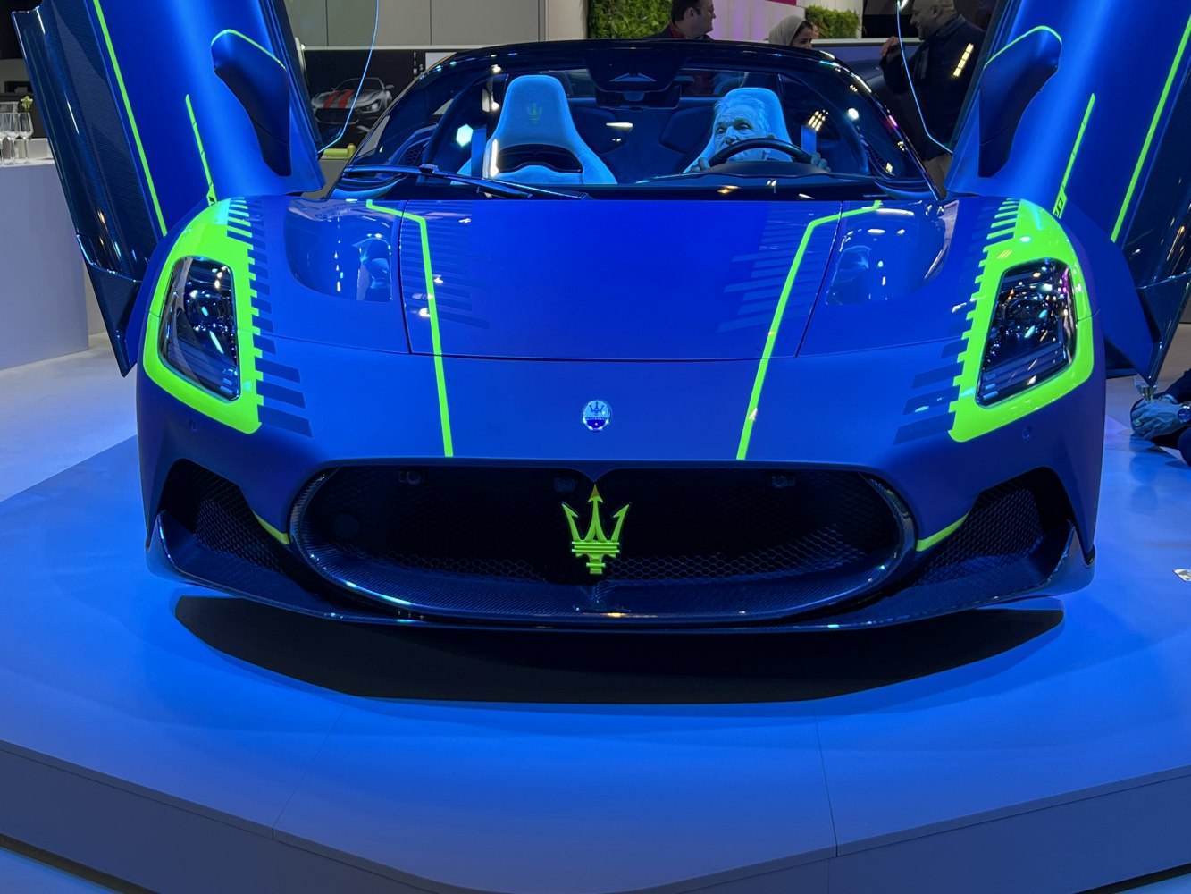Front view with scissor doors and neon green accent lines