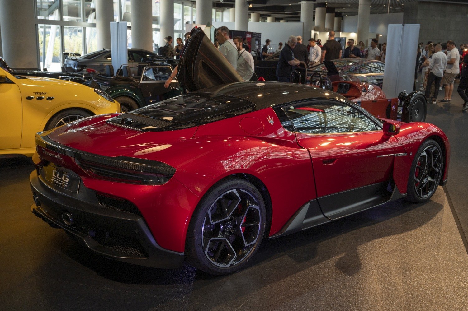 Sleek rear and side profile of a red high-performance modern sports car