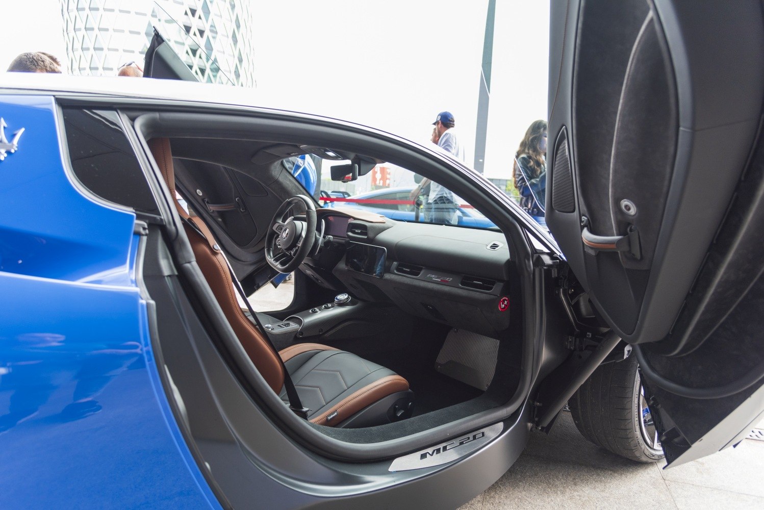 Interior and butterfly door design of a sports car.