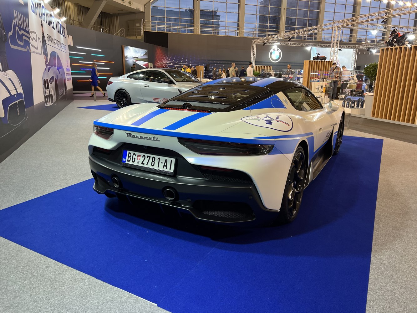 Rear view of a sports coupe with race livery and aerodynamic features