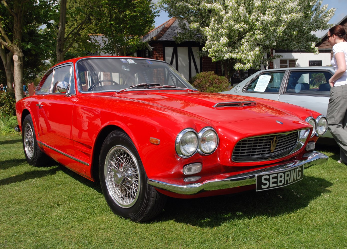 Classic coupe with dual circular headlights and wire-spoke wheels