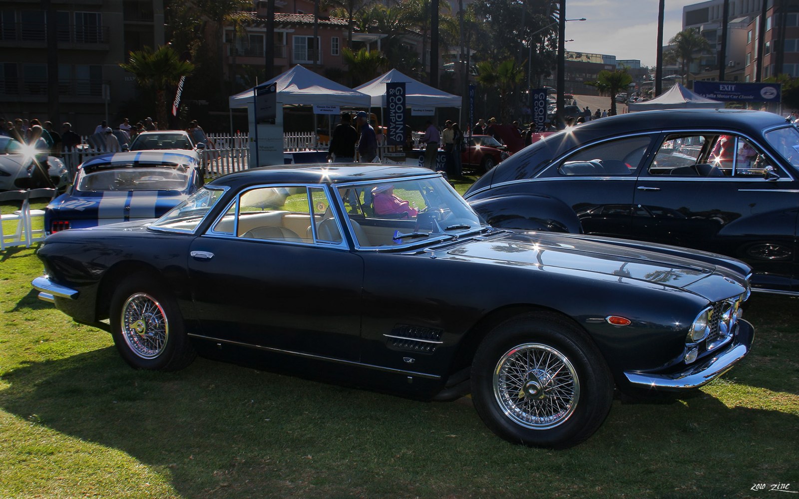 Classic coupe with wire wheels and distinctive side vents