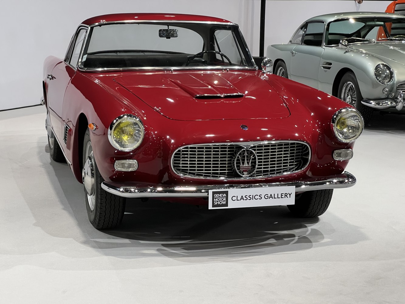 Classic front view with round headlights and chrome grille