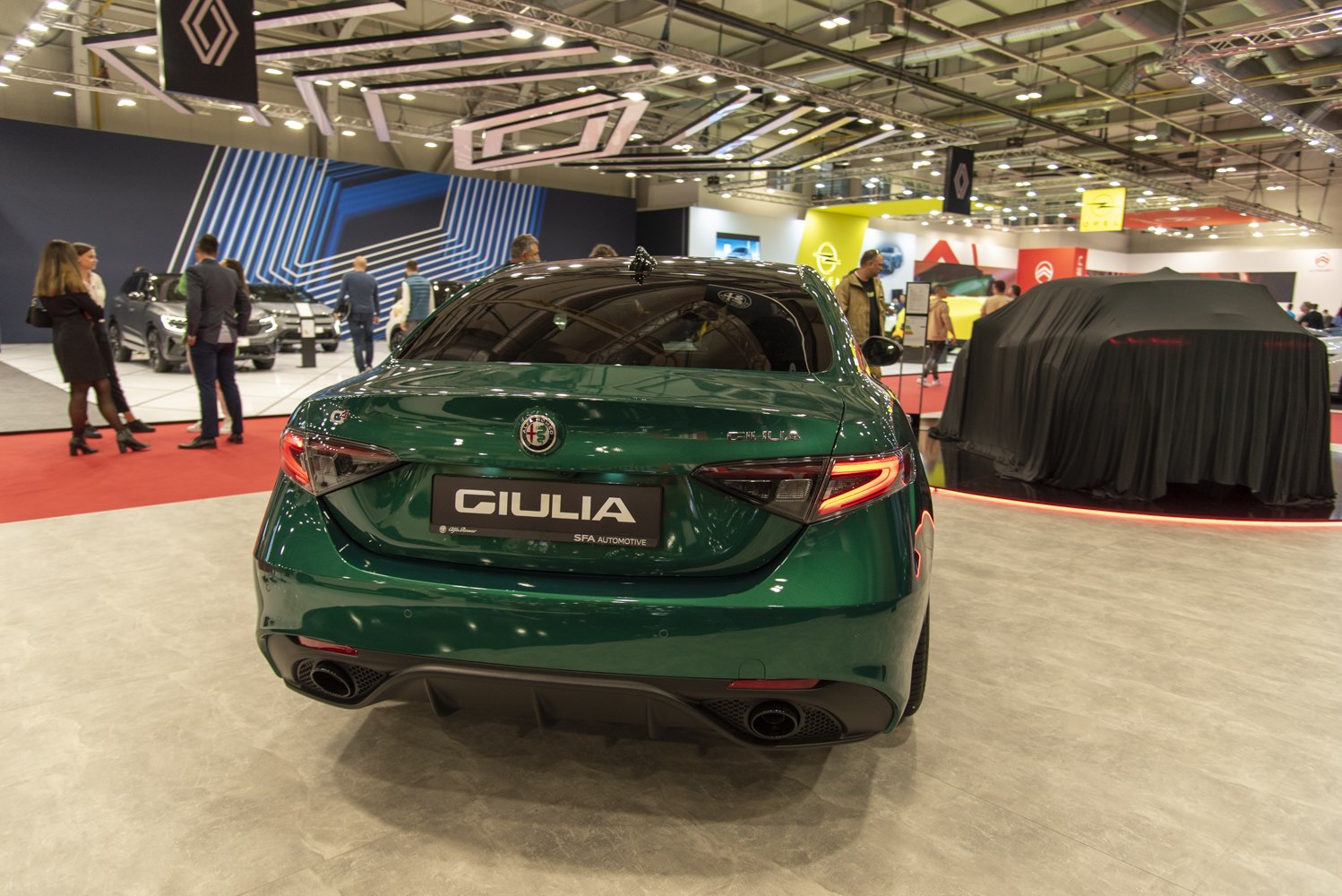 Rear view with distinctive taillights and dual exhausts