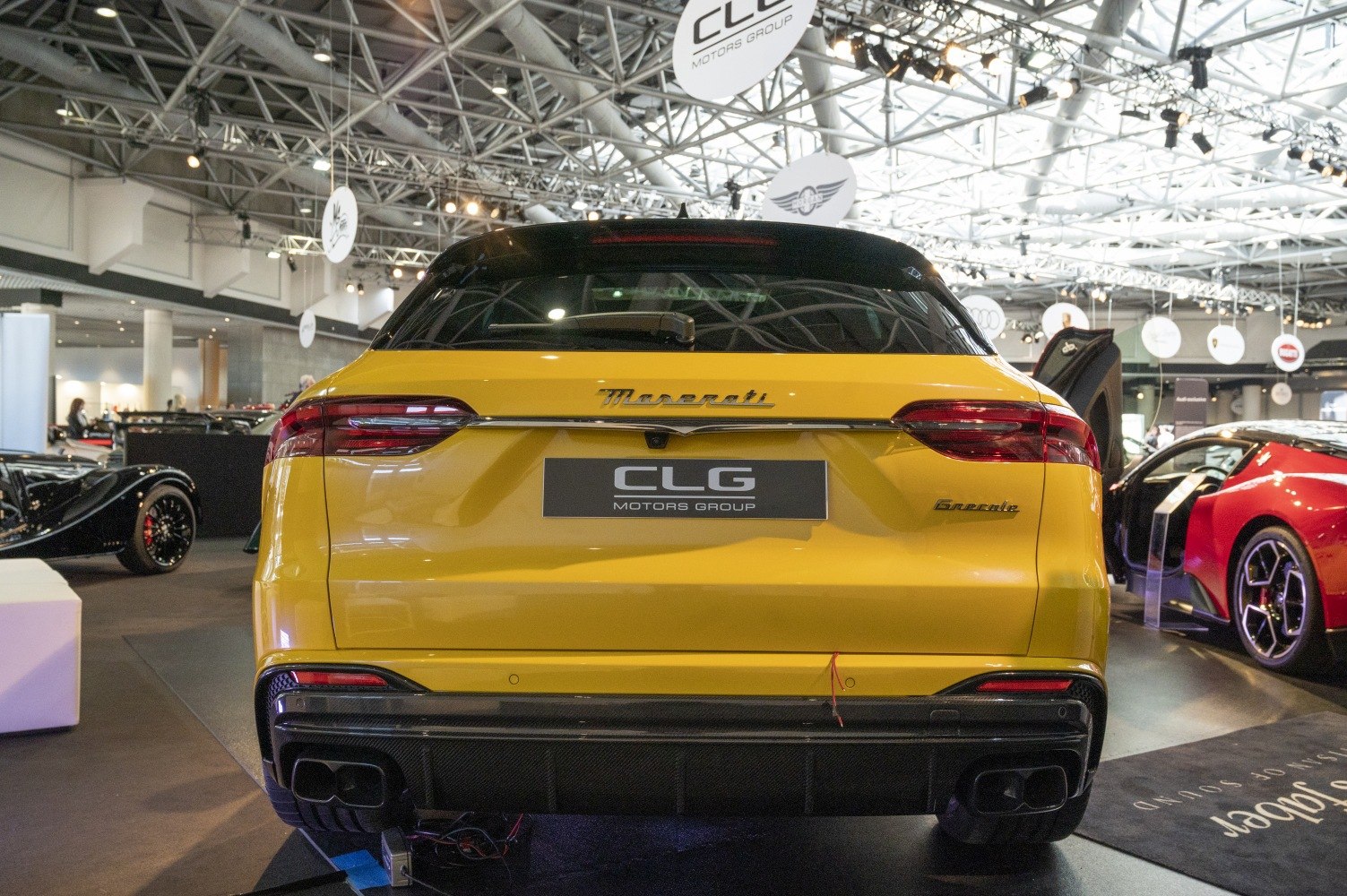 Luxury SUV rear with LED taillights and quad exhaust pipes