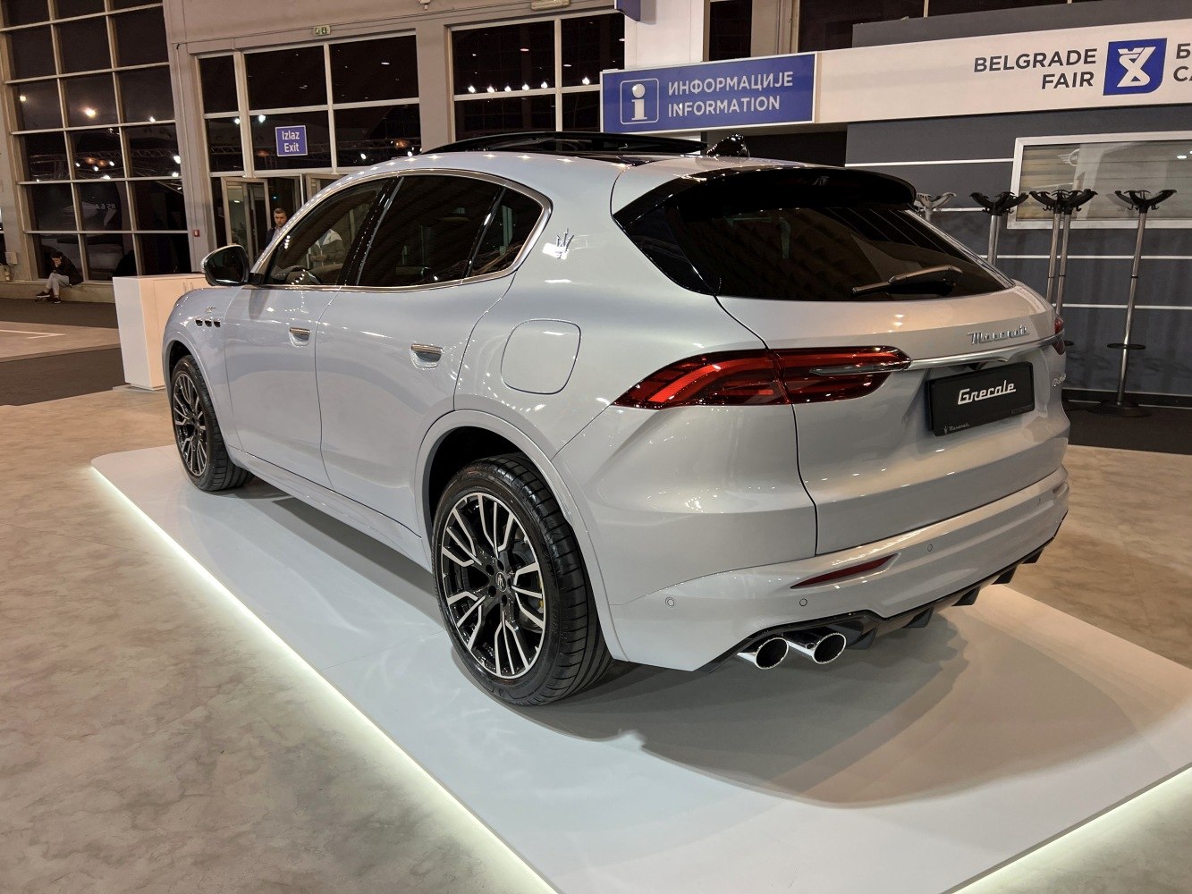 Rear and side profile with distinctive taillights and quad exhaust pipes