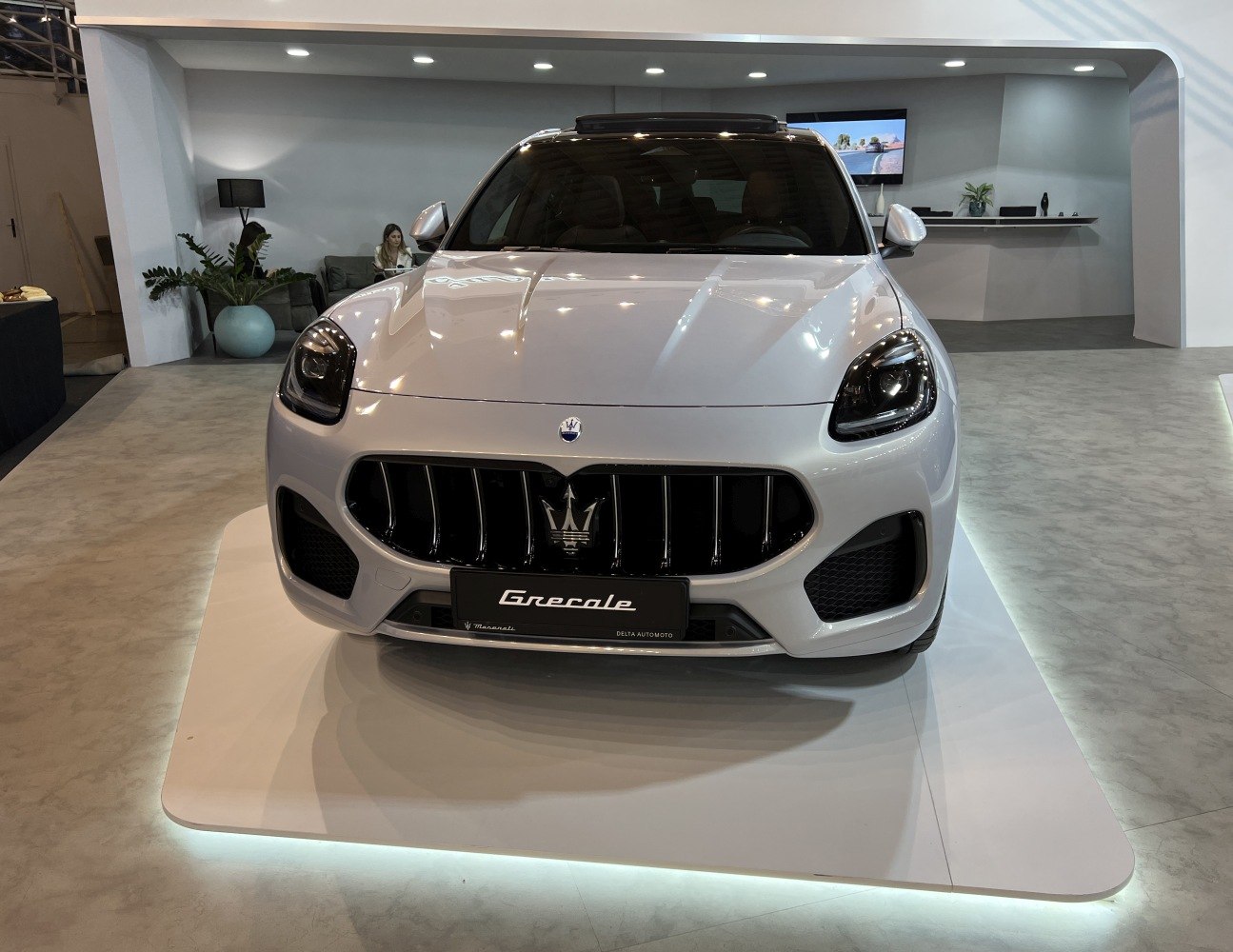 Front grille and headlights of a luxury SUV.