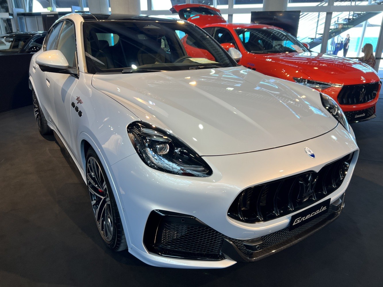 Front grille and sharp headlight design of a luxury SUV