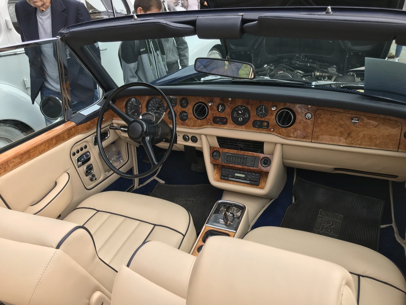 Convertible interior with wood dashboard and classic analog gauges