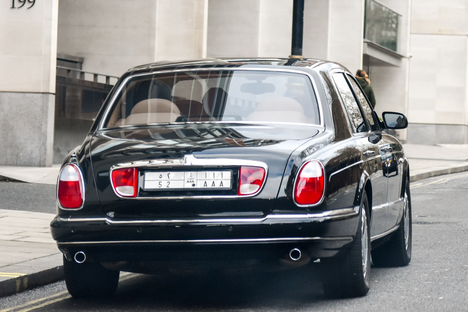 Rear view with distinct taillights dual exhaust pipes