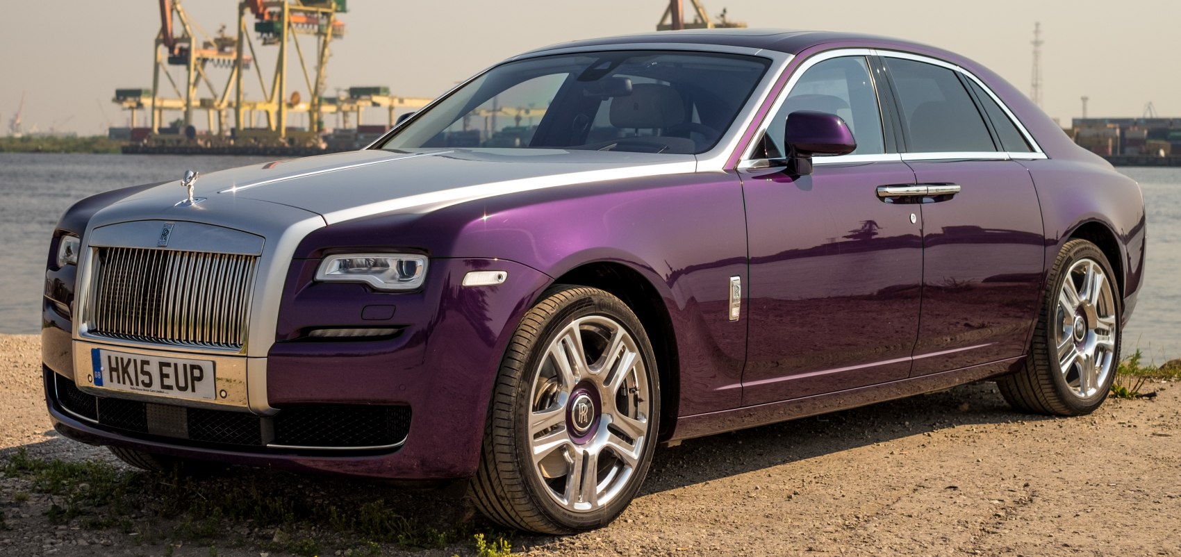 Two-tone purple and silver luxury saloon with iconic grille