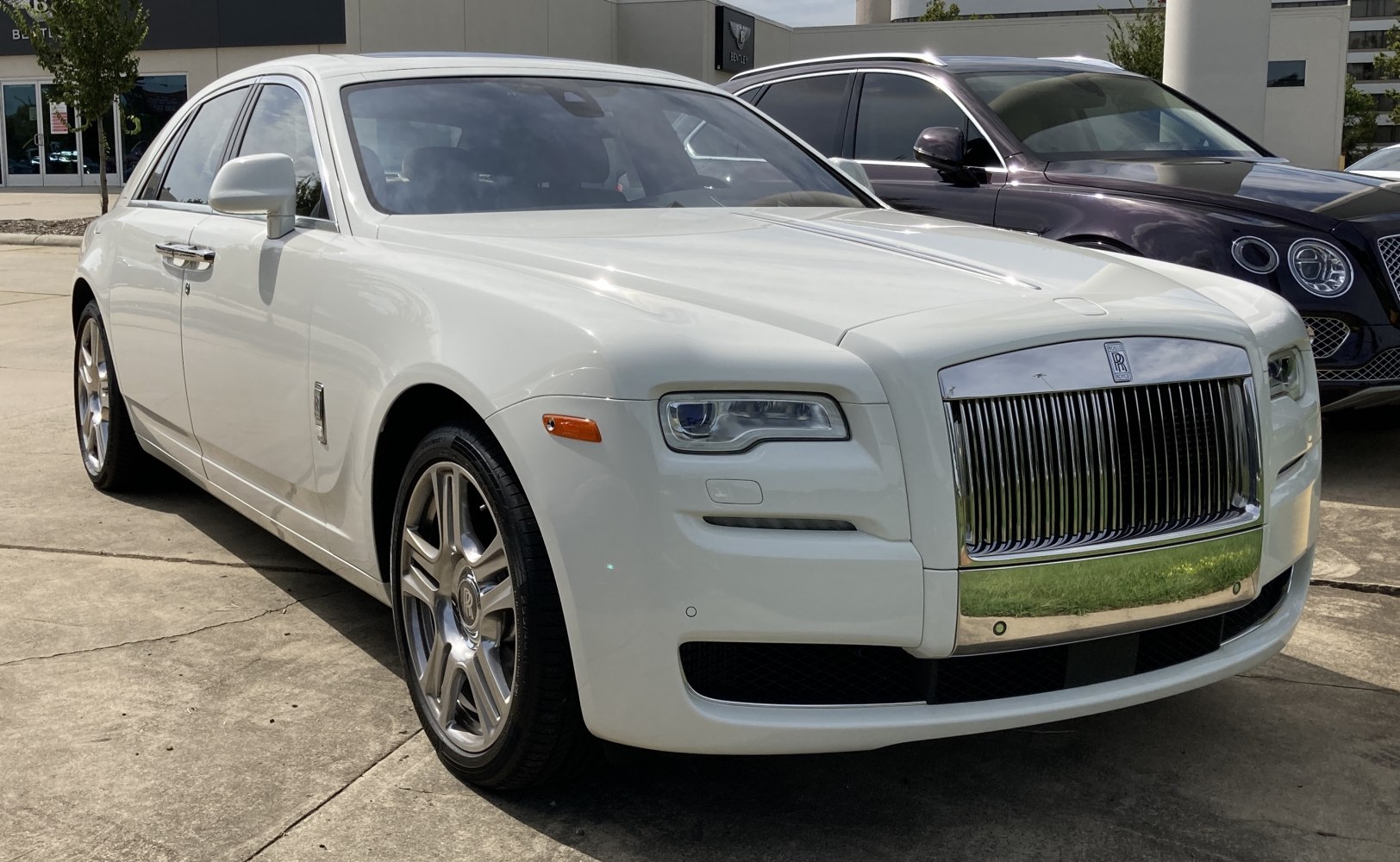 Luxury sedan with iconic grille and sleek headlights