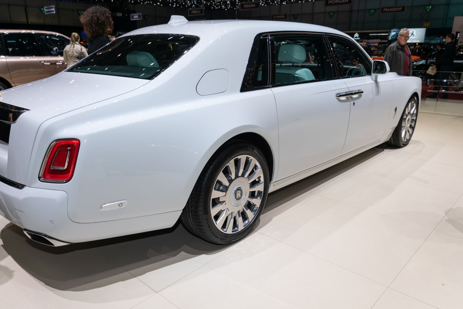 Luxury extended wheelbase sedan with chrome multi-spoke alloy wheels