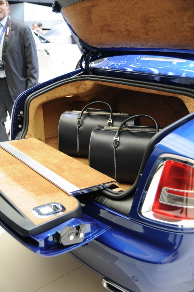 Luxury trunk interior with custom leather luggage