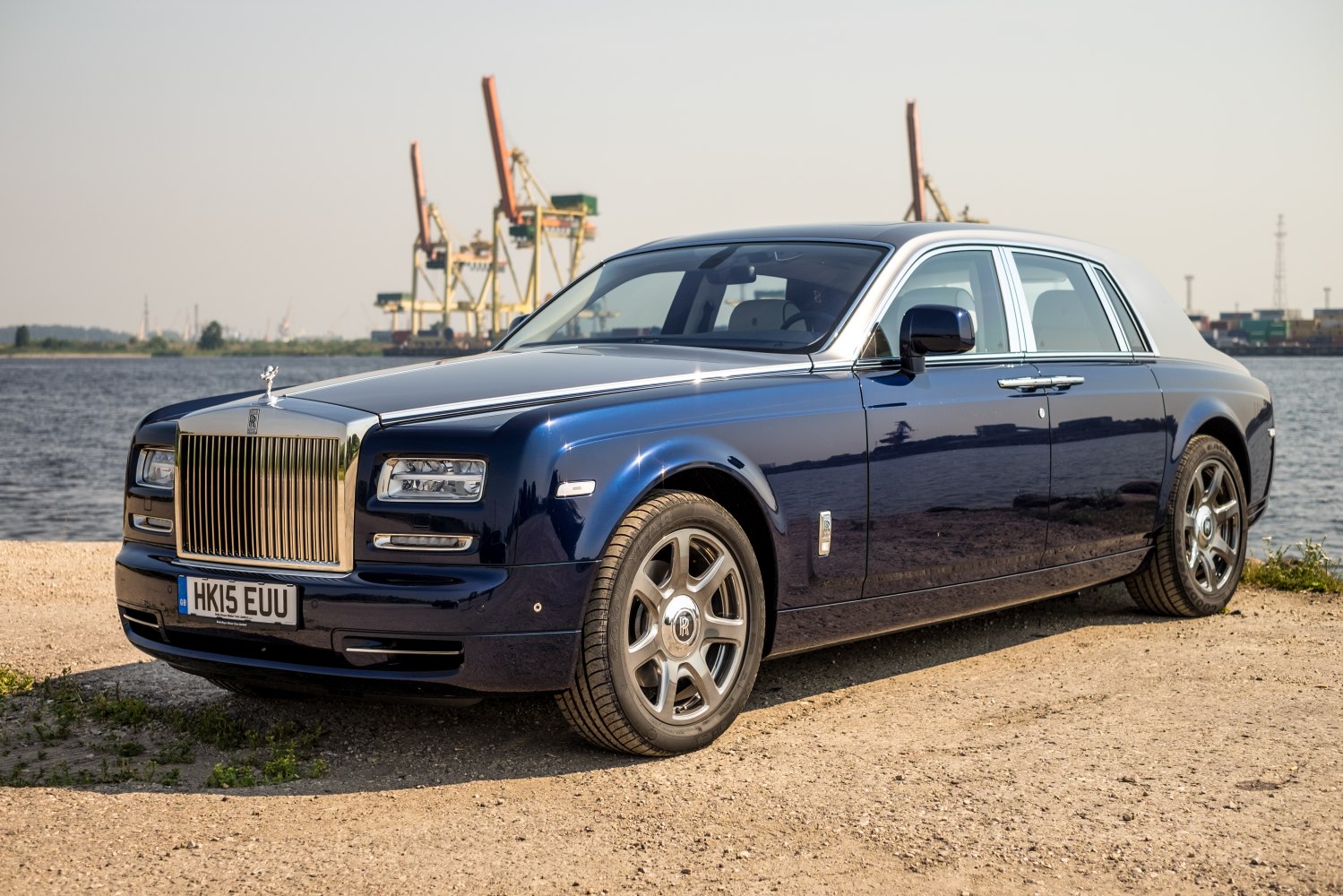 Luxury blue sedan with chrome grille and classic design