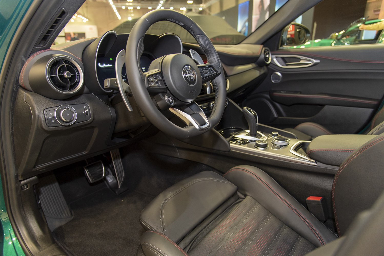 Modern steering wheel and center console with digital cluster
